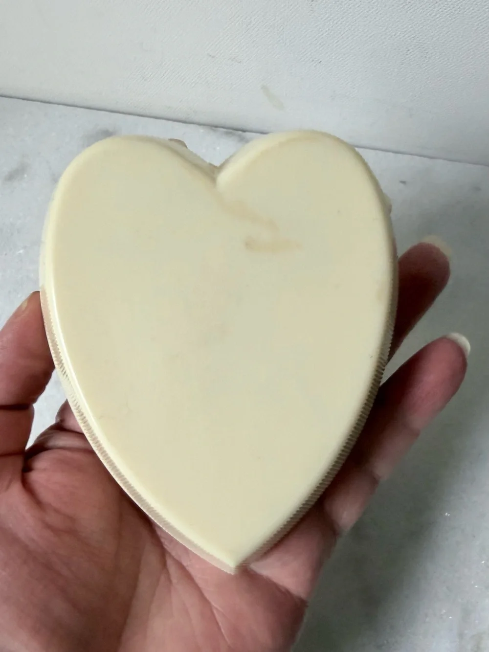 vintage Art Deco-style cream celluloid heart-shaped jewelry box